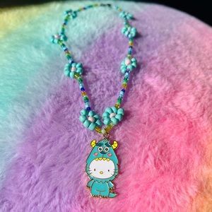 Hello kitty X monsters Inc. enamel charm hand beaded necklace